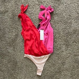 Vici Tie Shoulder Bodysuit- XS NWT
Never been worn.
Ordered too small as size